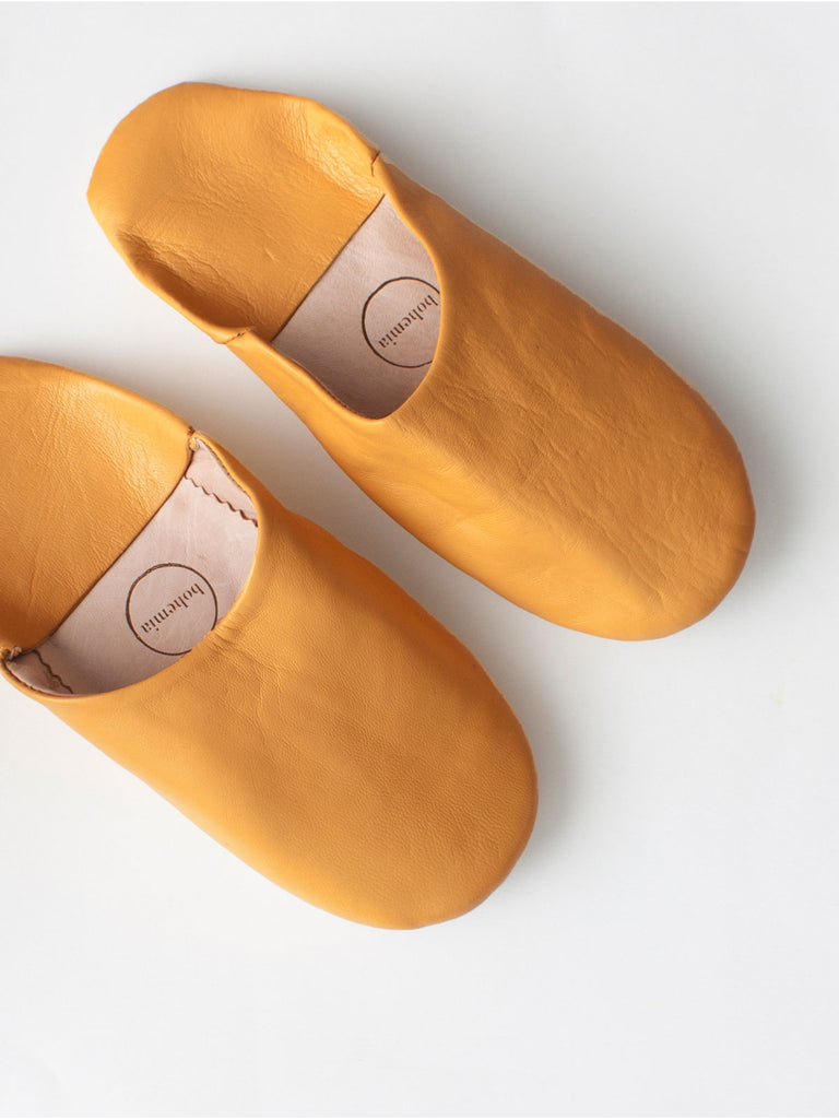 Moroccan babouche slippers in soft leather dyed ochre yellow