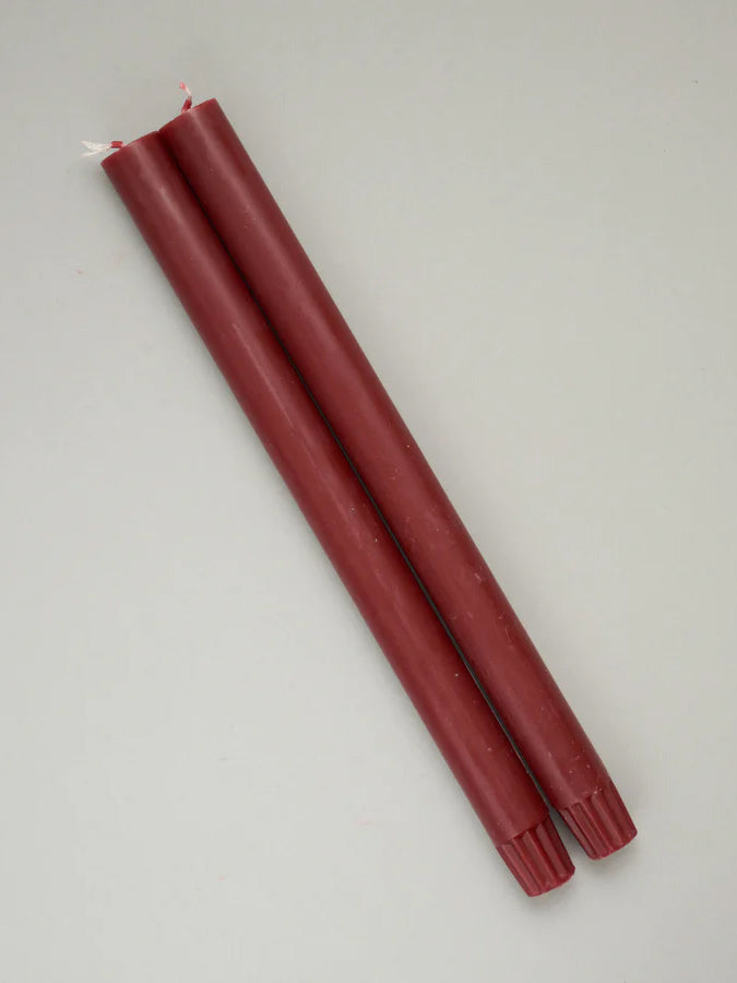 A deep Berry Red pair of dining candles 