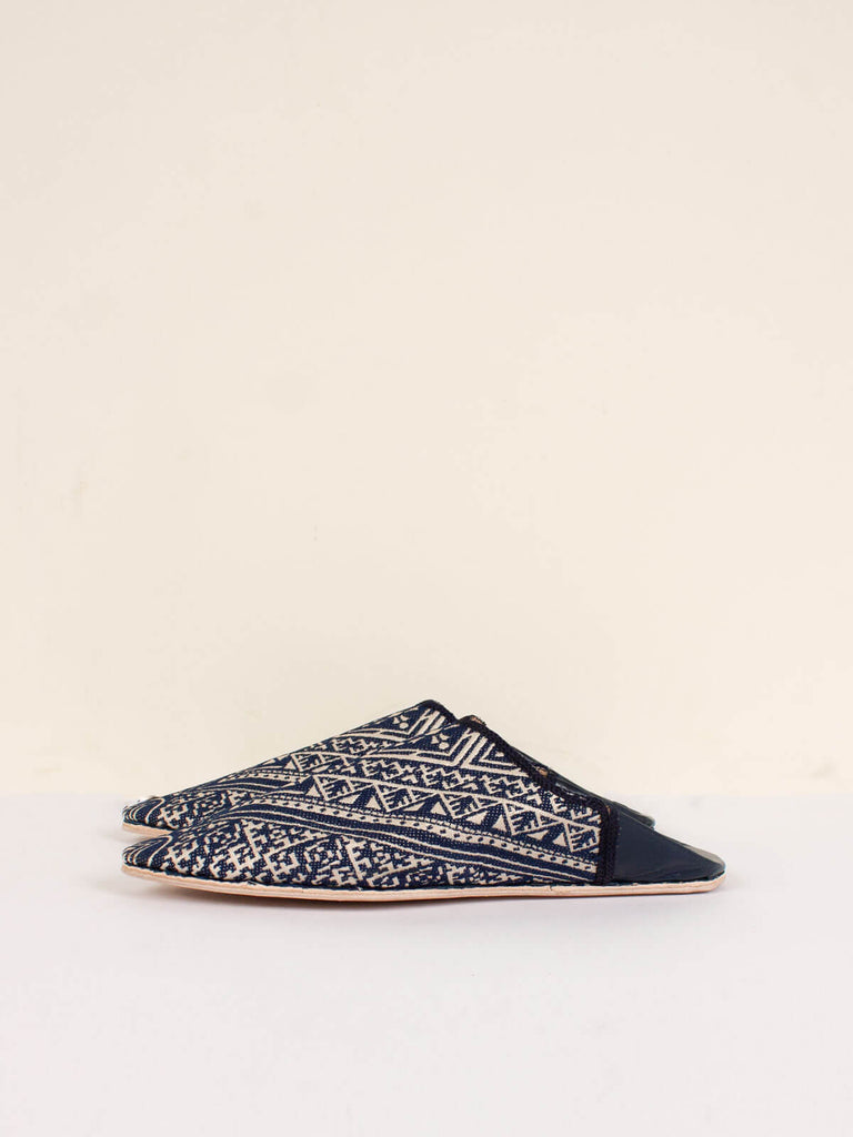 Side view of a pair of Moroccan Jacquard Pointed Babouche Slippers in Indigo