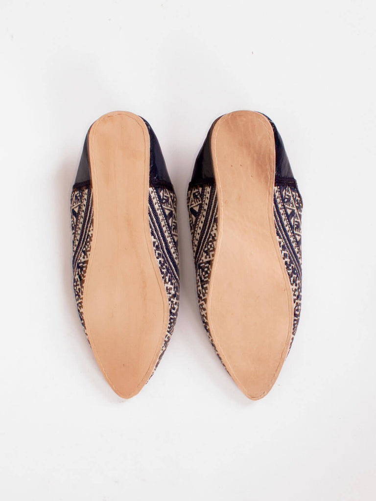 Hard leather sole of a pair of Moroccan Jacquard Pointed Babouche Slippers in Indigo