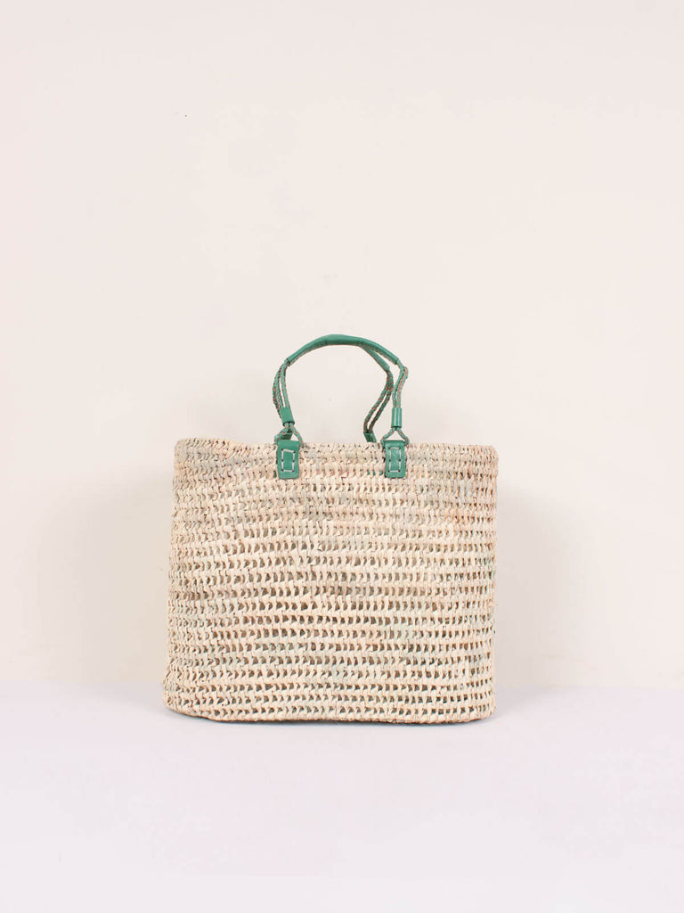 Large open weave basket with sage coloured pleated leather handles