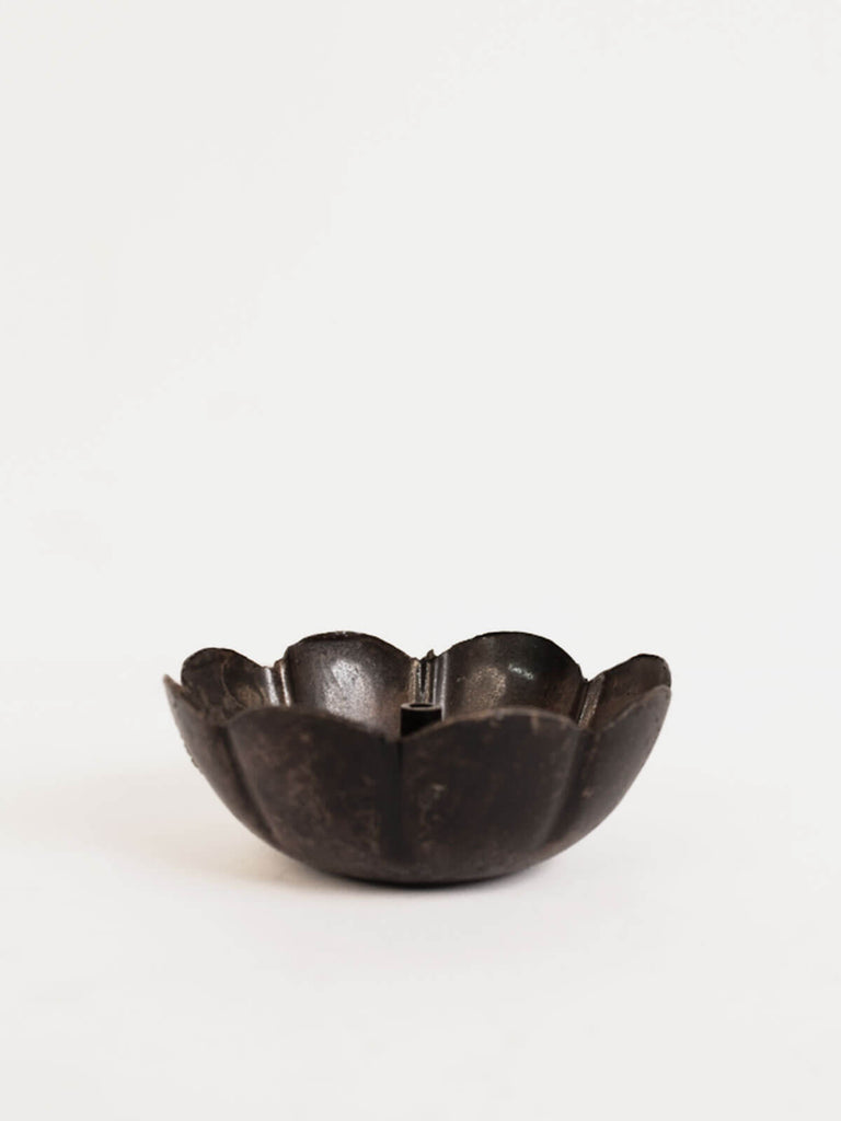 Detail of petalled edge and antiqued metal Poppy incense holder
