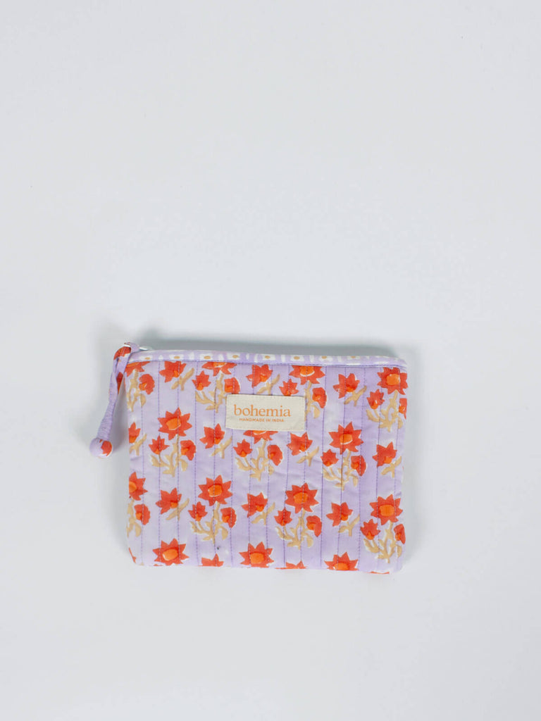 Medium quilted cotton zip pouch hand block printed in Jaipur, fully lined with a lilac and orange ditsy print