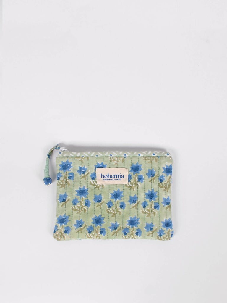 Medium quilted cotton zip pouch hand block printed in Jaipur, fully lined with a sage green and blue ditsy print 