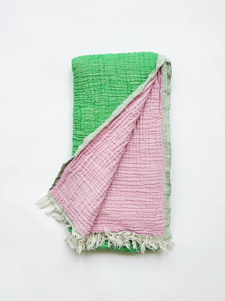 Two tone double sided 100% cotton muslin hammam towel in green and rose pink 