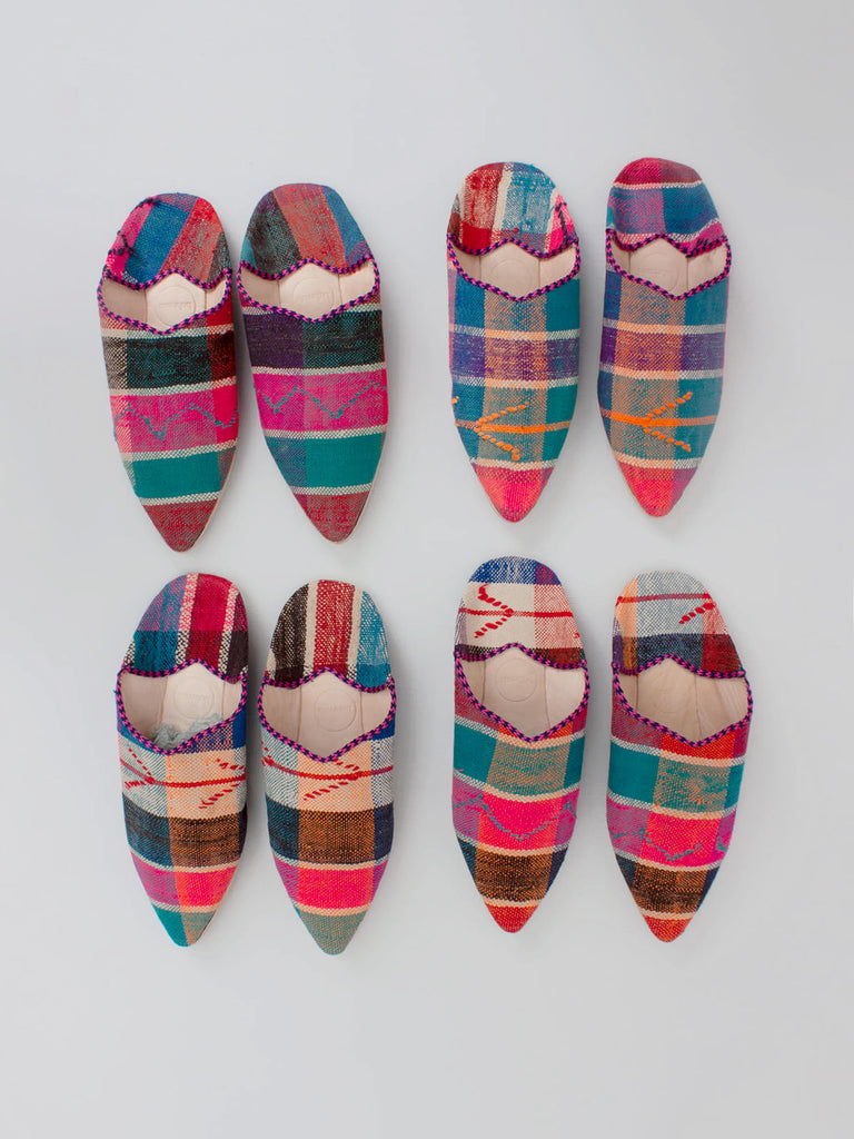 A group of handmade Moroccan Boujad Pointed Babouche Slippers with unique patterns by Bohemia Design