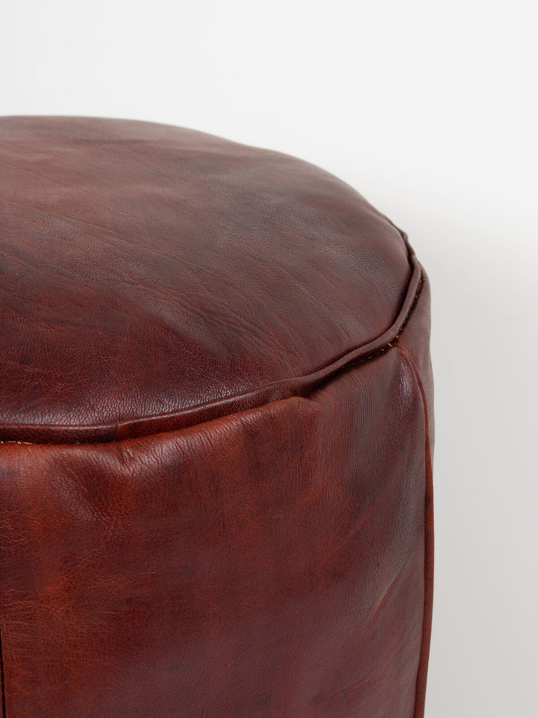 Close up of the stitching on the Moroccan Leather Plain Drum Pouffe, Chocolate