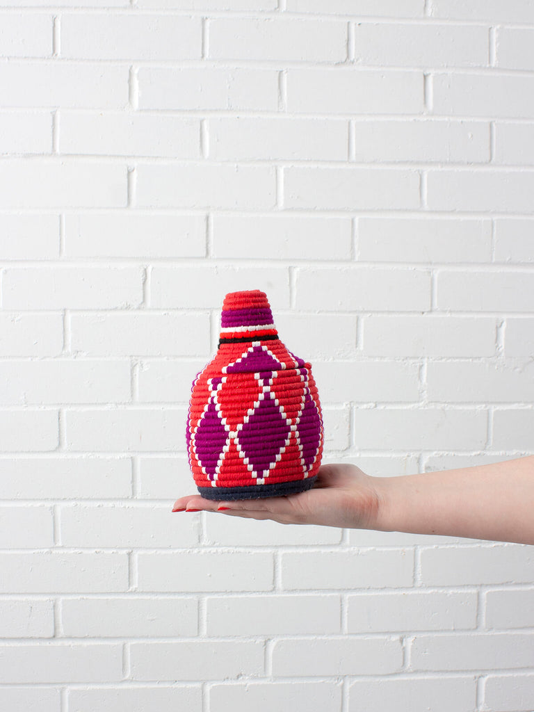 Moroccan wool storage pot by Bohemia Design in pink and purple pattern