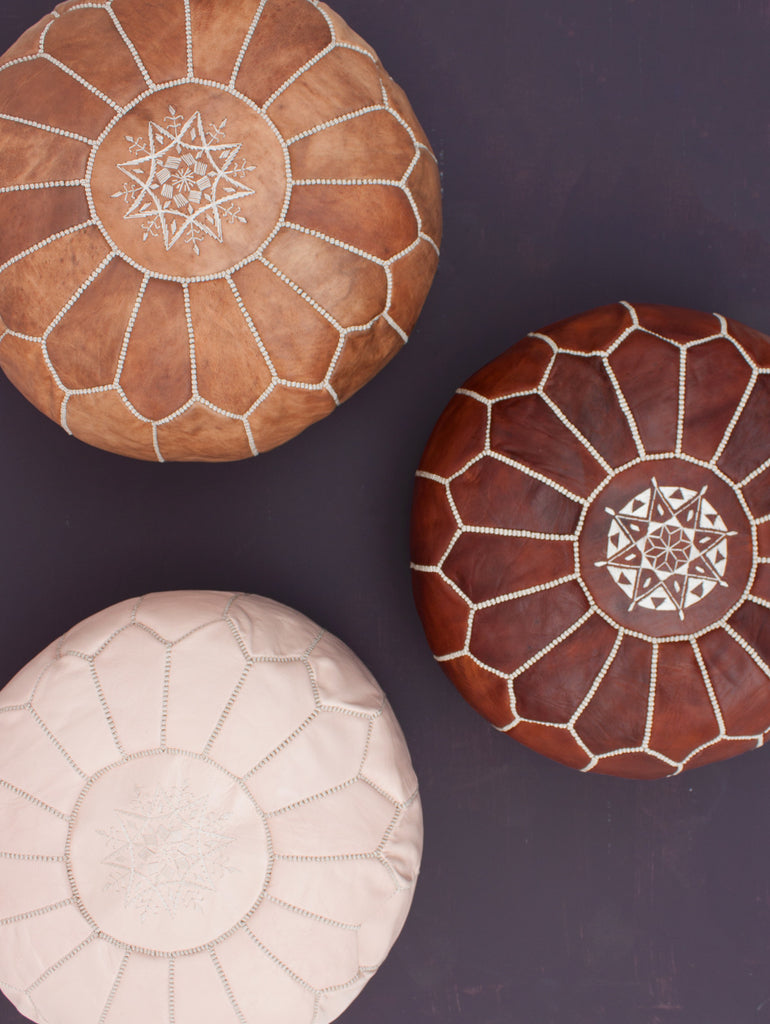 Group of Bohemia Moroccan leather pouffes in different colours