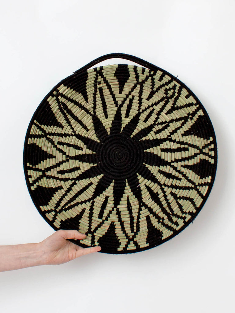 Moroccan decorative wall basket made from coiled reeds and black wool