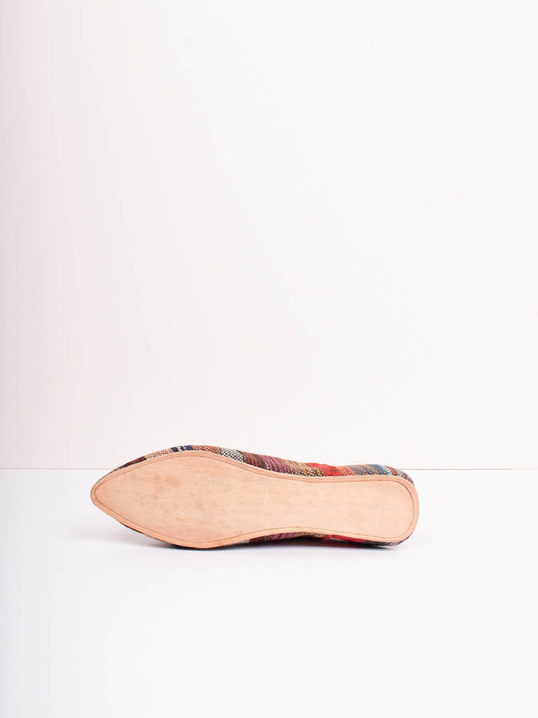 Underside of Moroccan boujad babouche slippers in atlas stripe pattern by Bohemia design