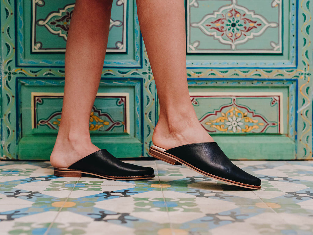 Bohemia-leather-mules-modelled-with-Moroccan-tiles-and-decorated-door