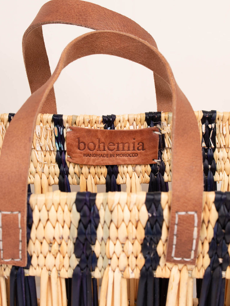 Handstamped leather Bohemia Design leather label inside a Decorative Reed Basket