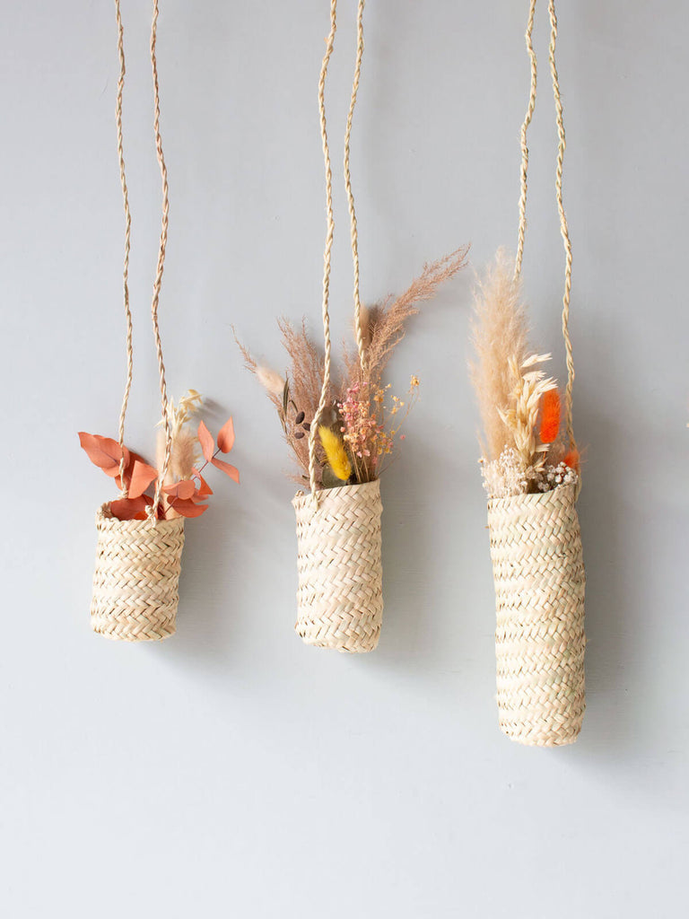 Three sizes of slim hanging basket filled with dried flowers