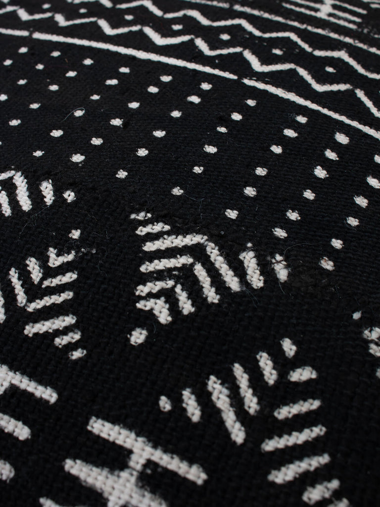 Detail of Black and cream cushion with a mudcloth pattern by Bohemia Design