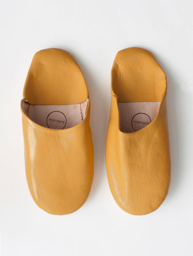 Soft soled slip on leather babouche slippers in ochre