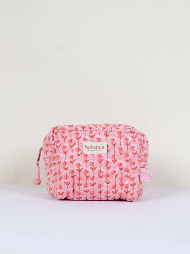 Small hand block print, cotton quilted wash bag with a vintage pink ditsy floral design