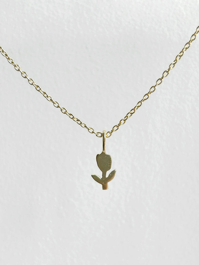 Tiny gold plated tulip necklace on a fine gold chain from the Bloom Collection