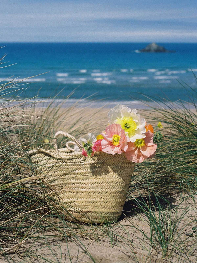 Medium Market Basket filled with flowers on a beach