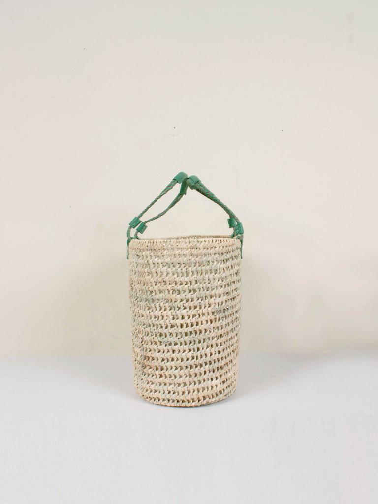 Side view of the pleated leather handle basket
