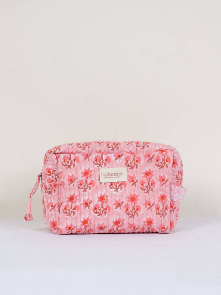 Medium hand block print, cotton quilted wash bag with a vintage pink floral design