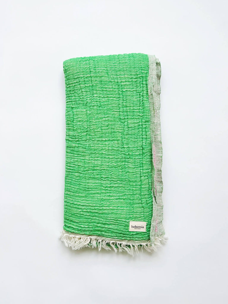 Soft double sided 100% cotton muslin hammam towel in green and rose pink