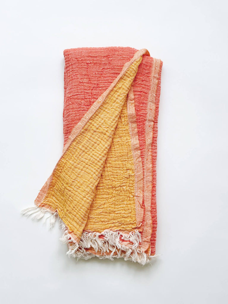 Soft cotton hammam towel in orange tones for summer