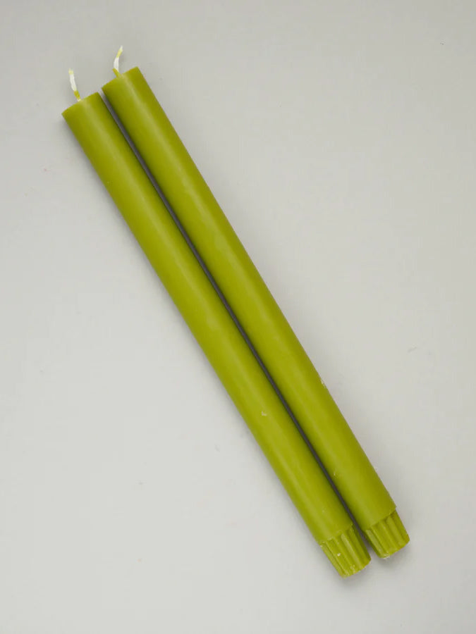 A vibrant, Leaf Green pair of dining candles 