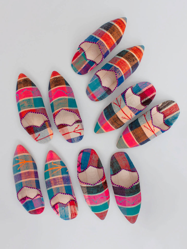 A group of limited edition Moroccan Boujad Fabric Basic Babouche Slippers each with a unique pattern by Bohemia Design