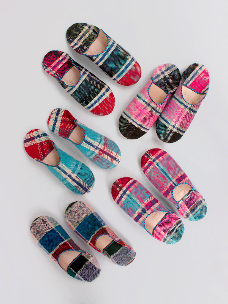 A group of limited edition Moroccan Boujad Fabric Basic Babouche Slippers, Essaouira Check in pink and blue plaid by Bohemia Design
