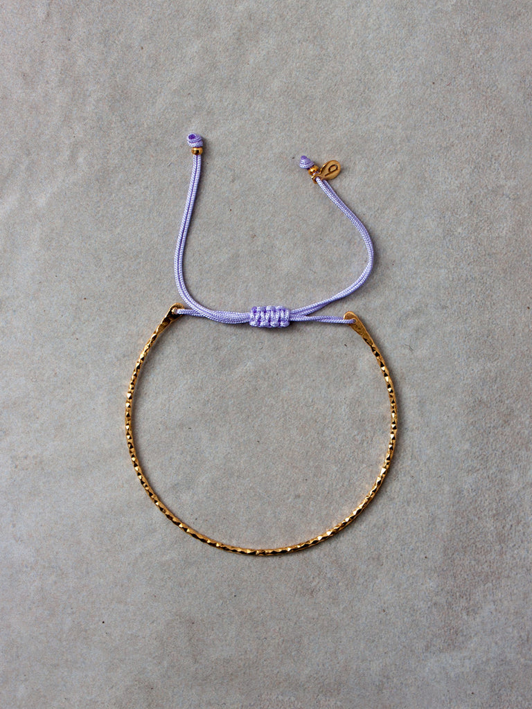 A delicate 18ct gold plated bracelet with an adjustable lilac silk thread by Bohemia Design