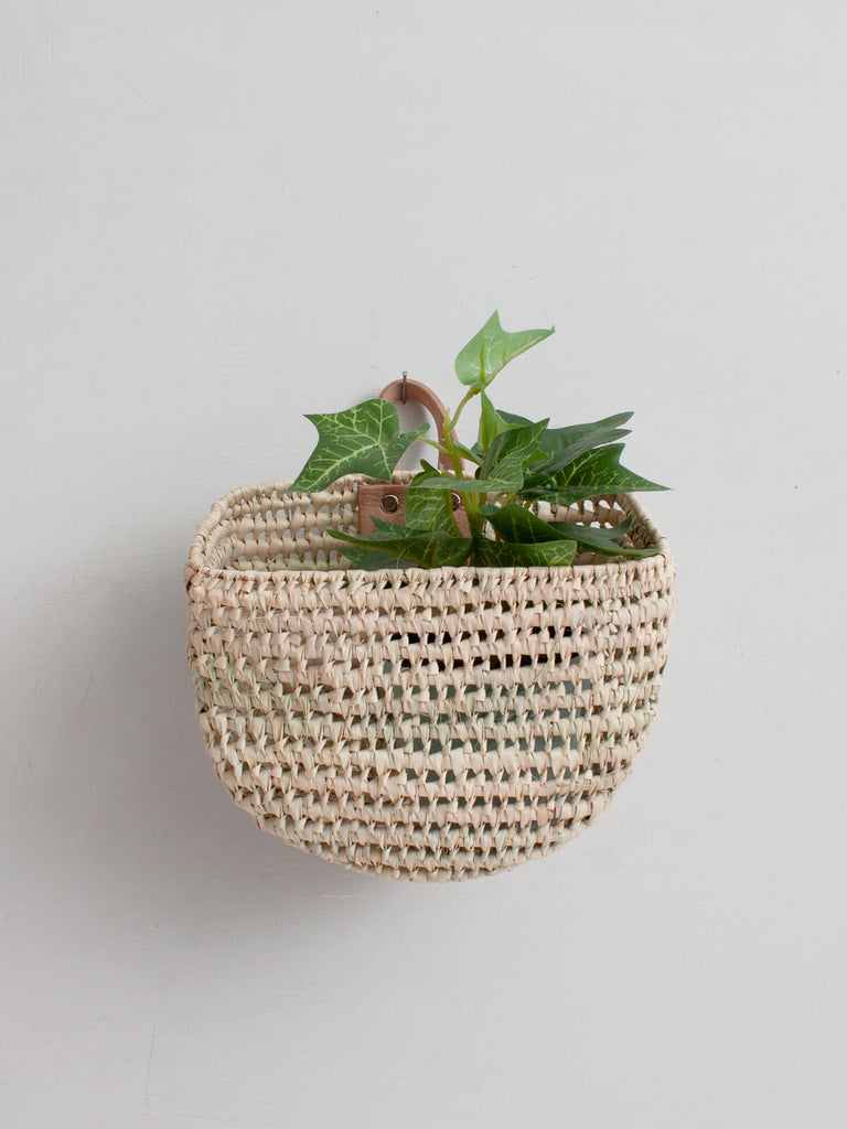 Compact and practical, mini woven wall hanging storage baskets designed for small spaces