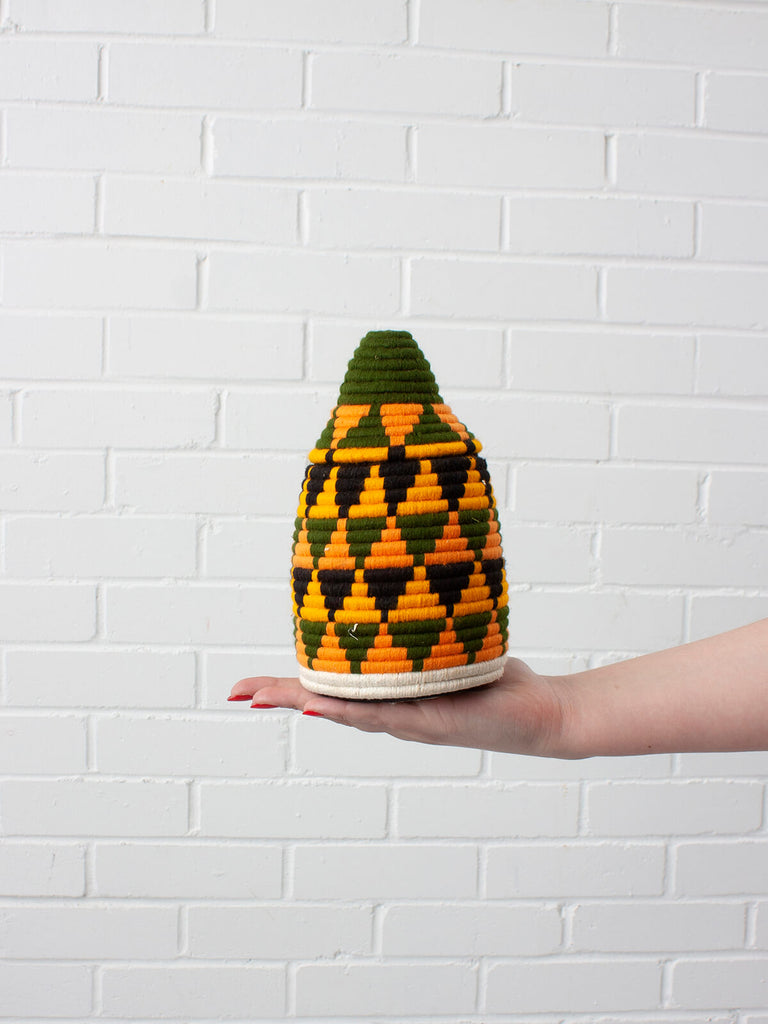 Moroccan wool storage pot by Bohemia Design in orange chevron pattern
