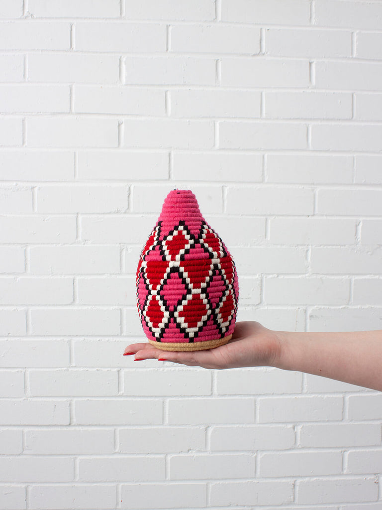 Moroccan wool storage pot by Bohemia Design in pink and red pattern