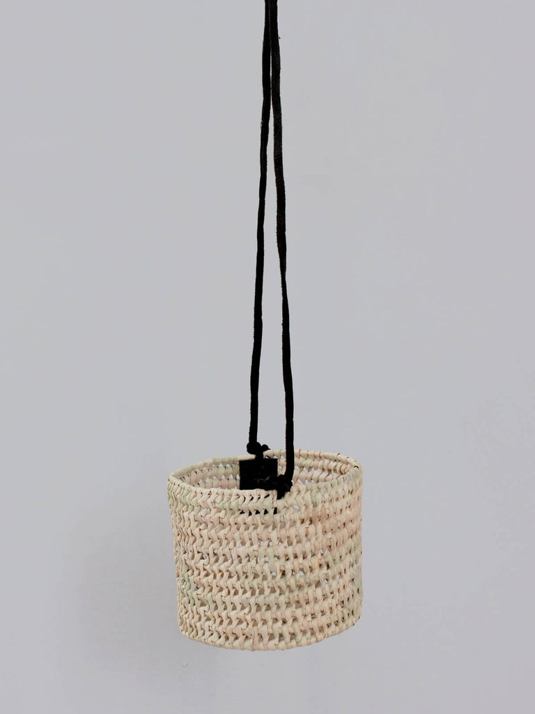 Small open weave indoor hanging plant pot, handwoven from natural materials in Morocco