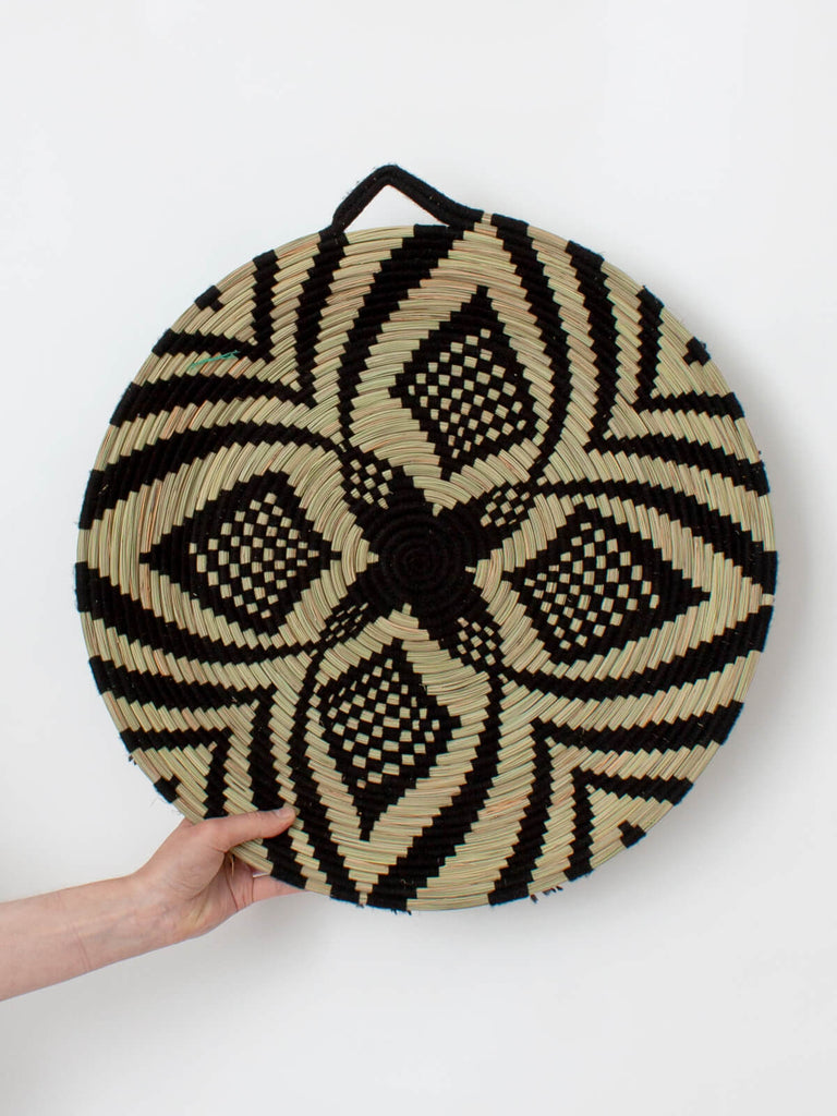 Moroccan decorative wall basket made from coiled reeds and black wool