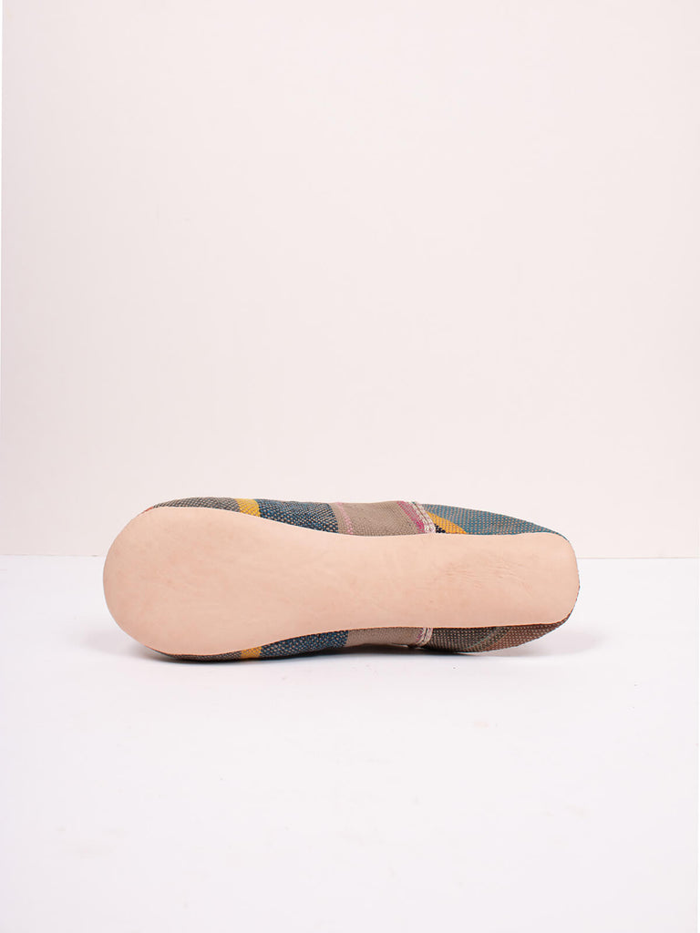 Underside of Bohemia design boujad babouche slippers in camel stripe pattern