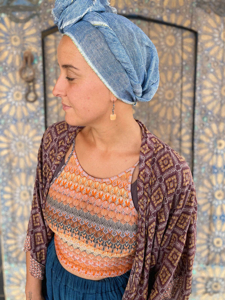 Linen Scarf in indigo and lemon worn as a headscarf