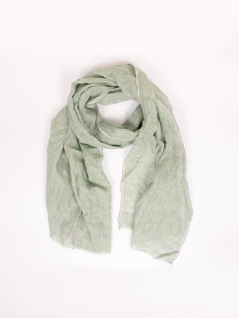 Linen Scarf in sage green with a subtle line of lilac stitching around the edges.