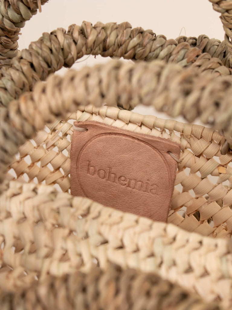 Leather Bohemia branded basket label on the inside of a basket