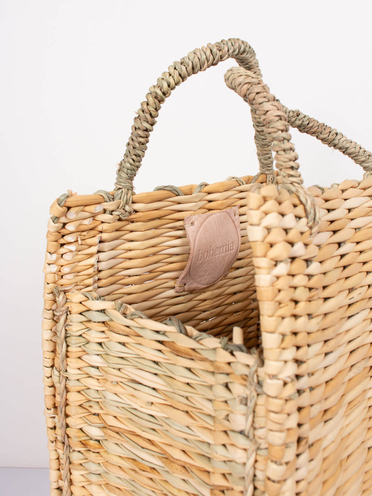 Handwoven natural reed box basket bag with hand stamped Bohemia leather label inside
