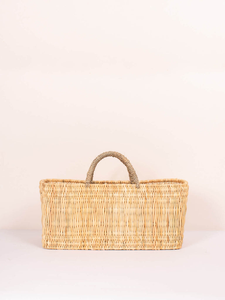 Medium Moroccan natural woven reed rectangular storage basket with sturdy handles