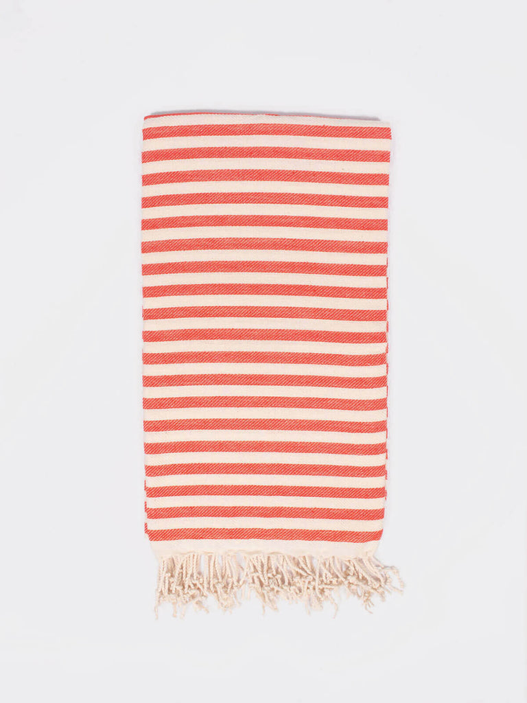Classic stripe cotton hammam towel in orange and off white with hand knotted tassels