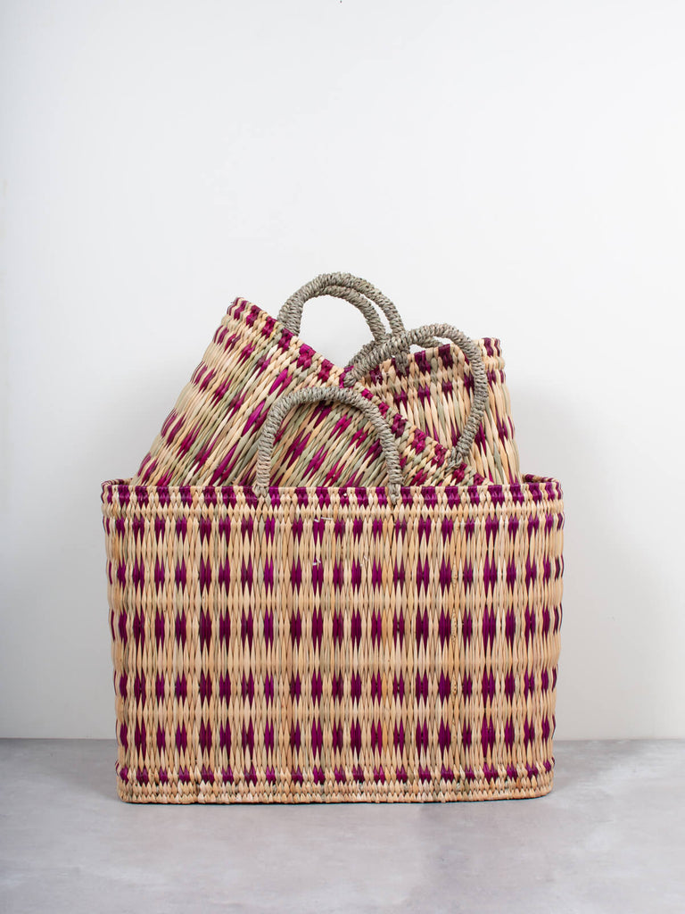 Set of 3 woven rectangular natural reed basket bags with short handles featuring a skillfully weaved violet pattern