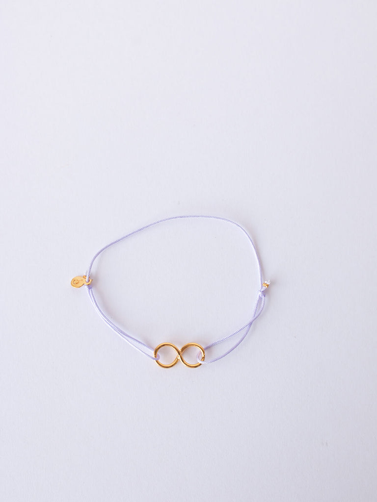 Gold and lilac silk thread friendship infinity bracelet by Bohemia Design