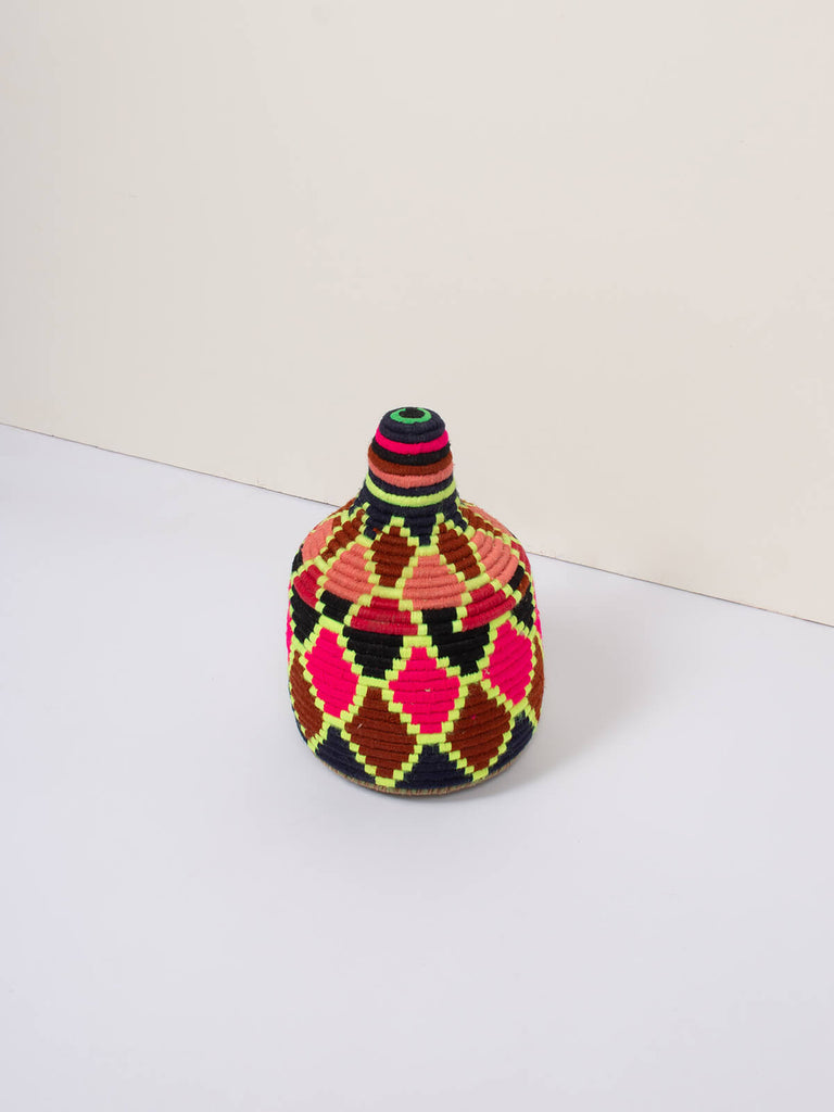 Moroccan wool storage pot by Bohemia Design in pink and brown neon pattern