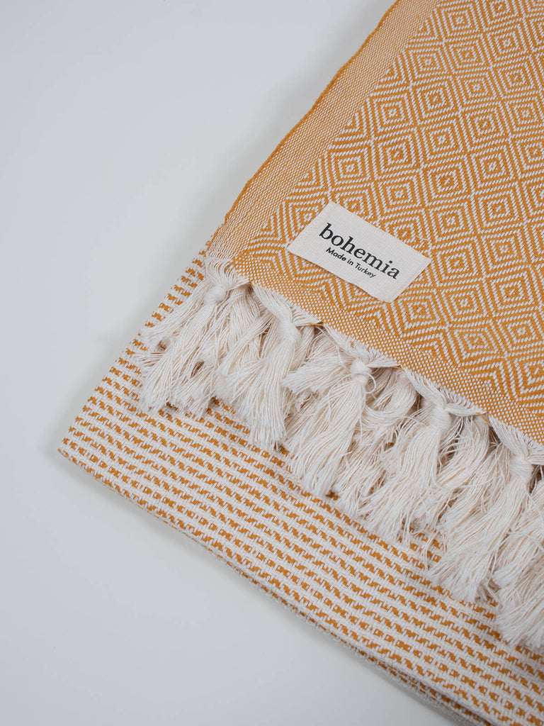 Nordic Dot Hammam Towel in mustard diamond pattern by Bohemia Design