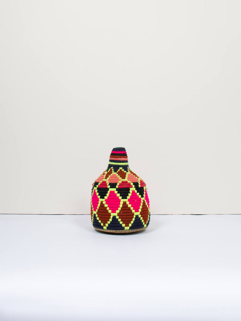 Moroccan wool storage pot by Bohemia Design in pink and brown neon pattern